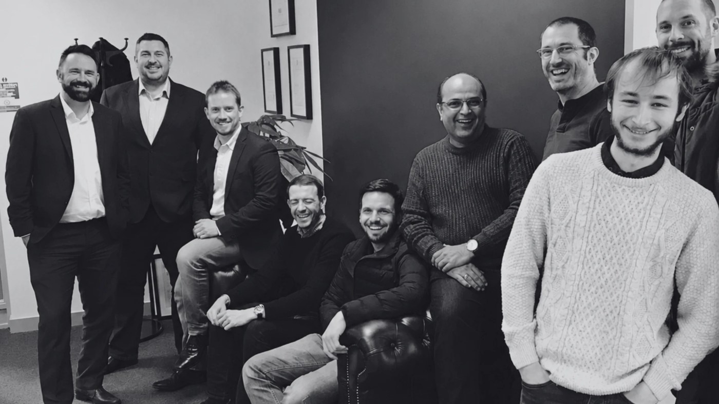 Paul with the peer-to-peer platform team in their office