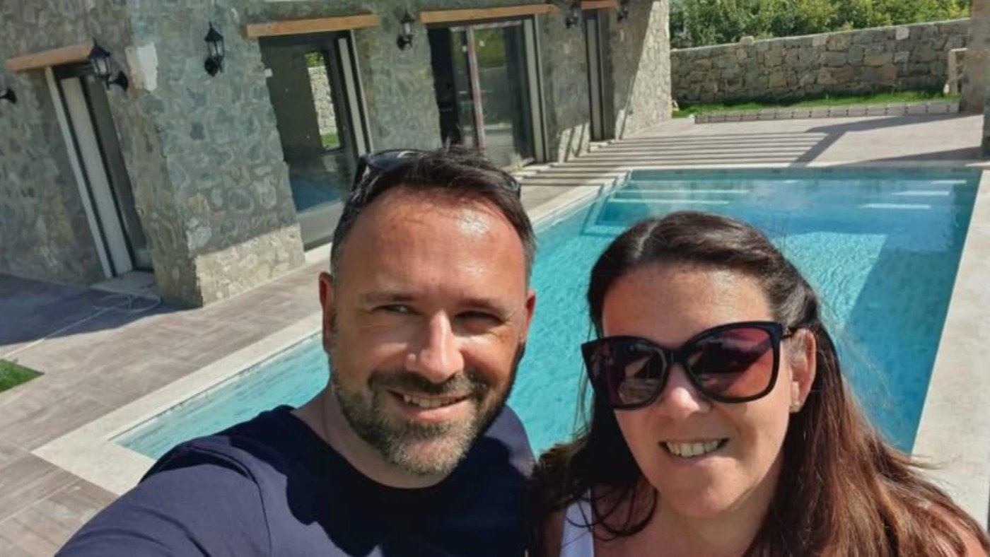Paul by the pool at his home overseas